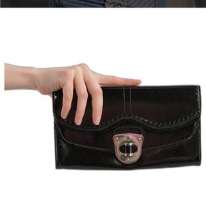 Authentic Alexander McQueen leather clutch, excellen preowned condition